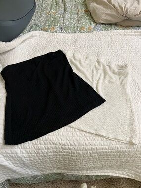 Like Love tube tanks in black and white.  Selling both together.